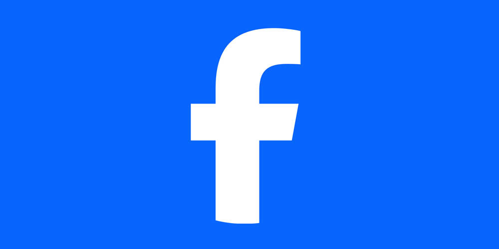 White Facebook F logo on a blue background.
