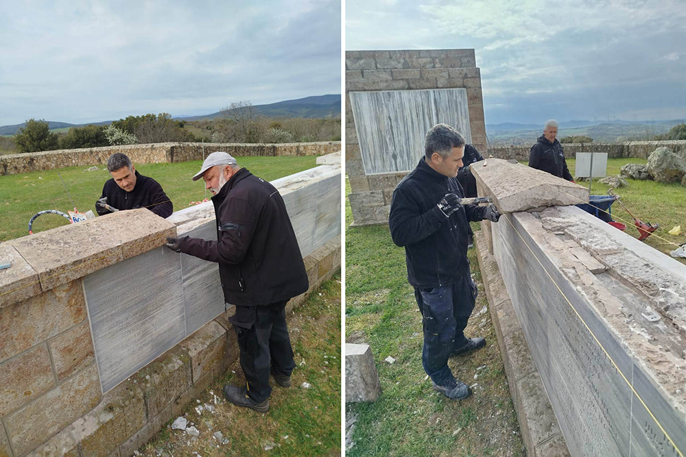 Workers adding capstones to the Doiran Memorial curtain wall.
